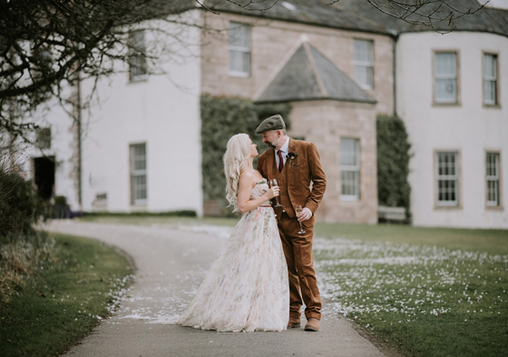 Bride and groom outside Aberdeen Wedding Venue Logie Country House